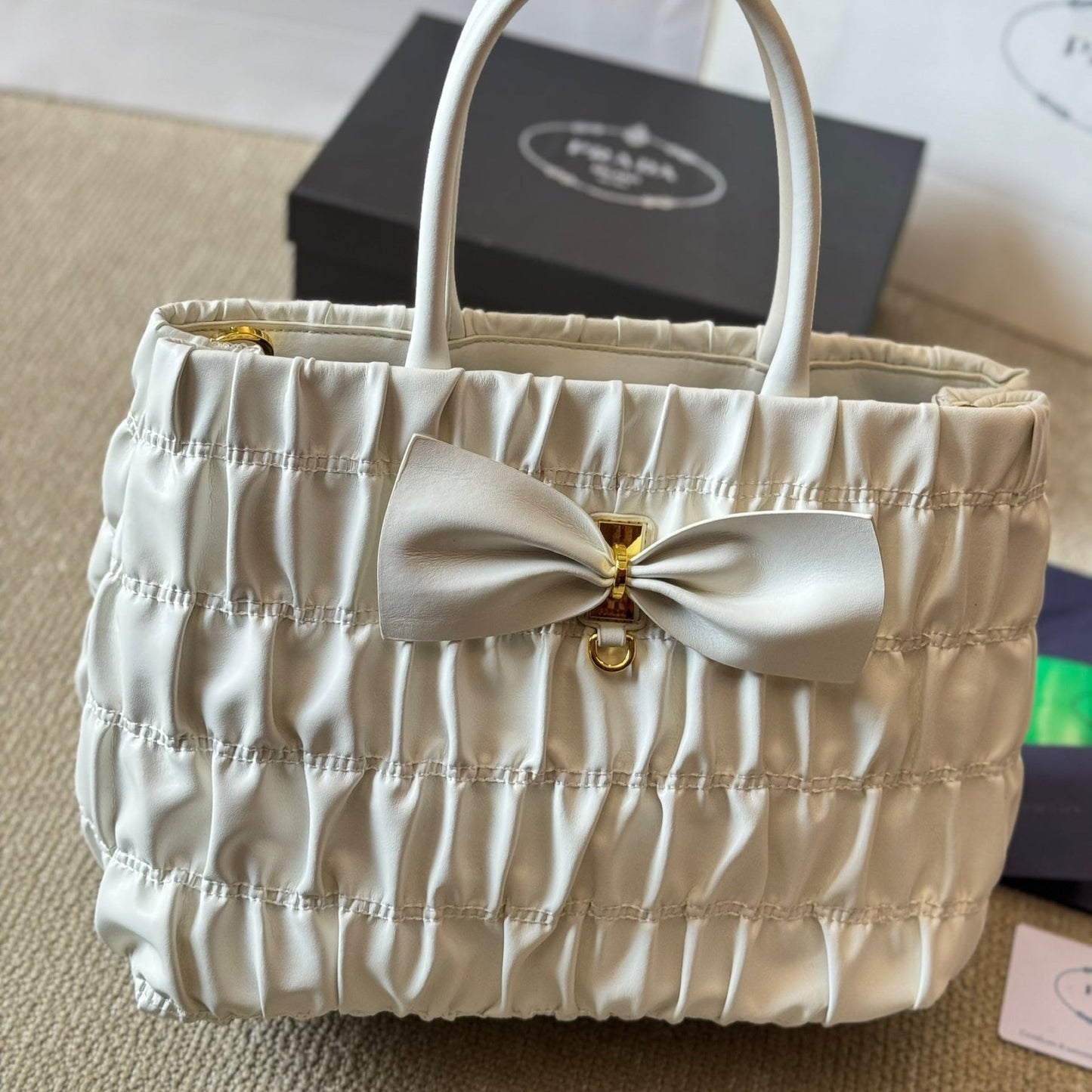 BOW DETAIL RUCHED TOP HANDLE BAG 28 IN WHITE SAFFIANO LEATHER