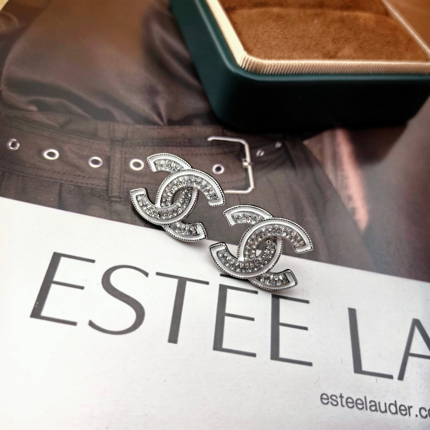 DOUBLE C STUD EARRINGS WITH WHITE TRIM AND CLEAR STONE LOGO