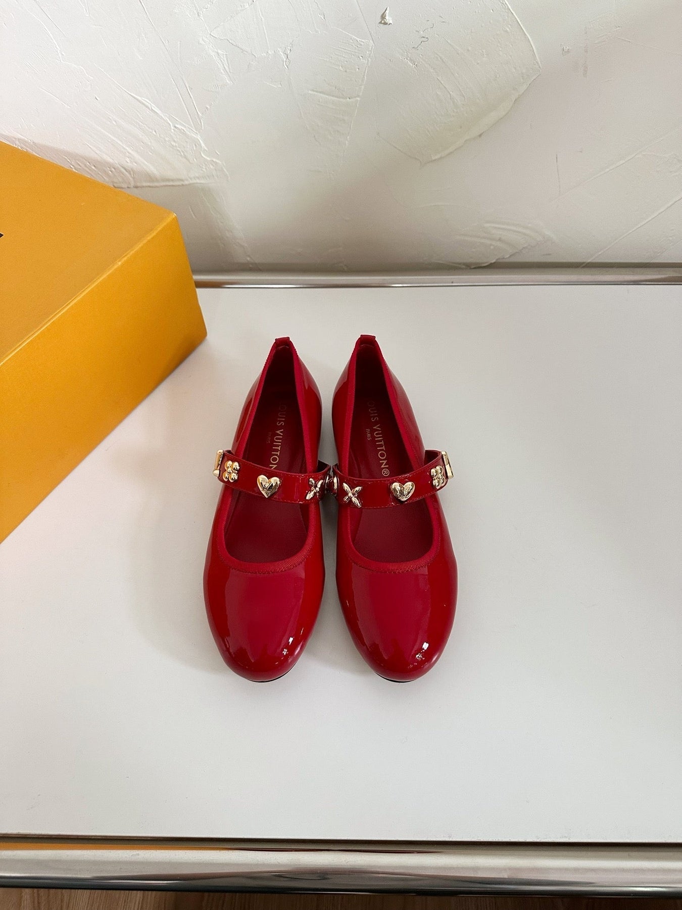 ROMY FLAT BALLERINA IN RUBY RED PATENT CALFSKIN