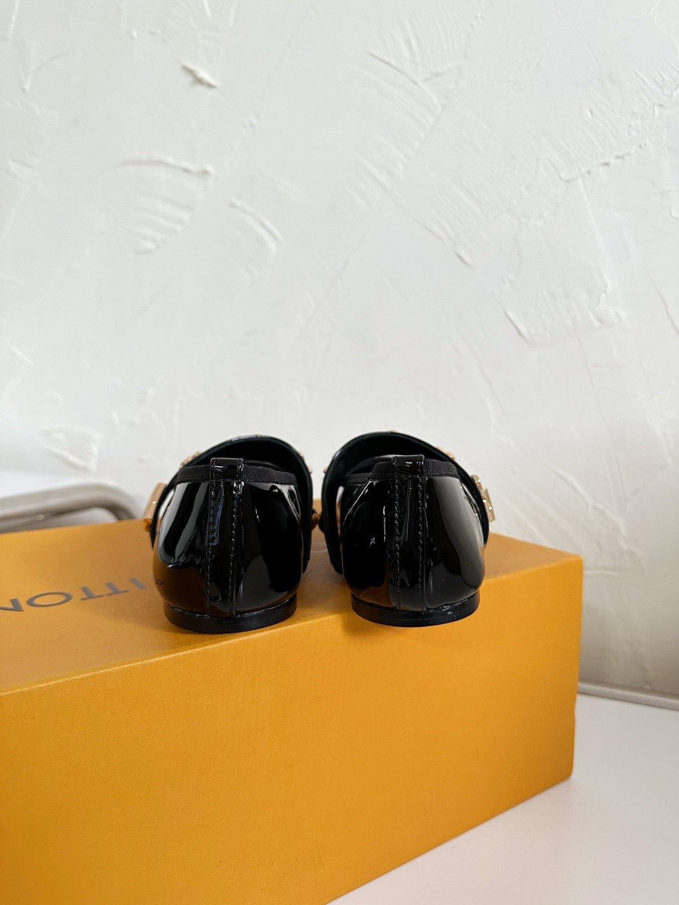 ROMY FLAT BALLERINA IN BLACK PATENT CALFSKIN