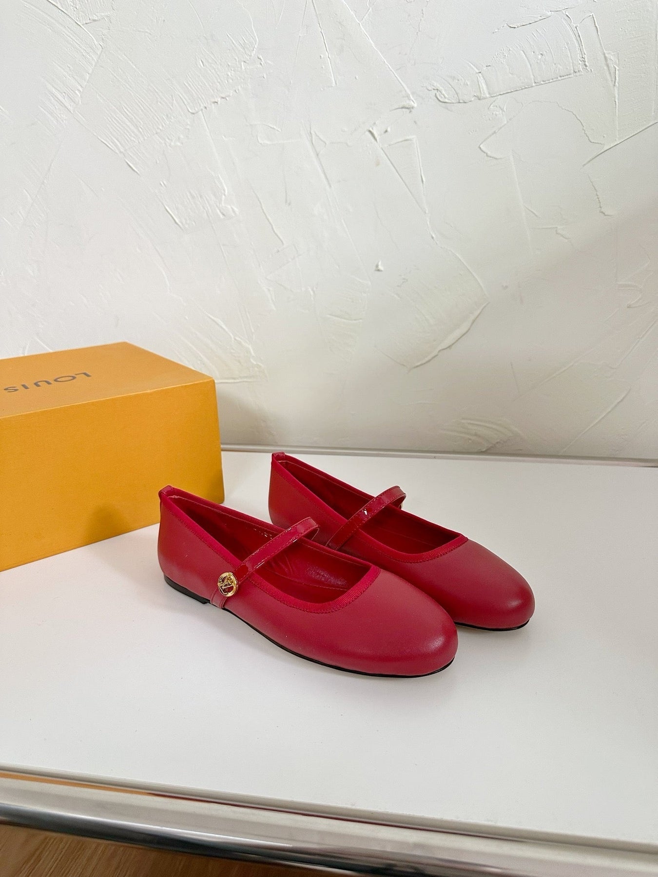 ROMY FLAT BALLERINA IN RUBY RED CALFSKIN
