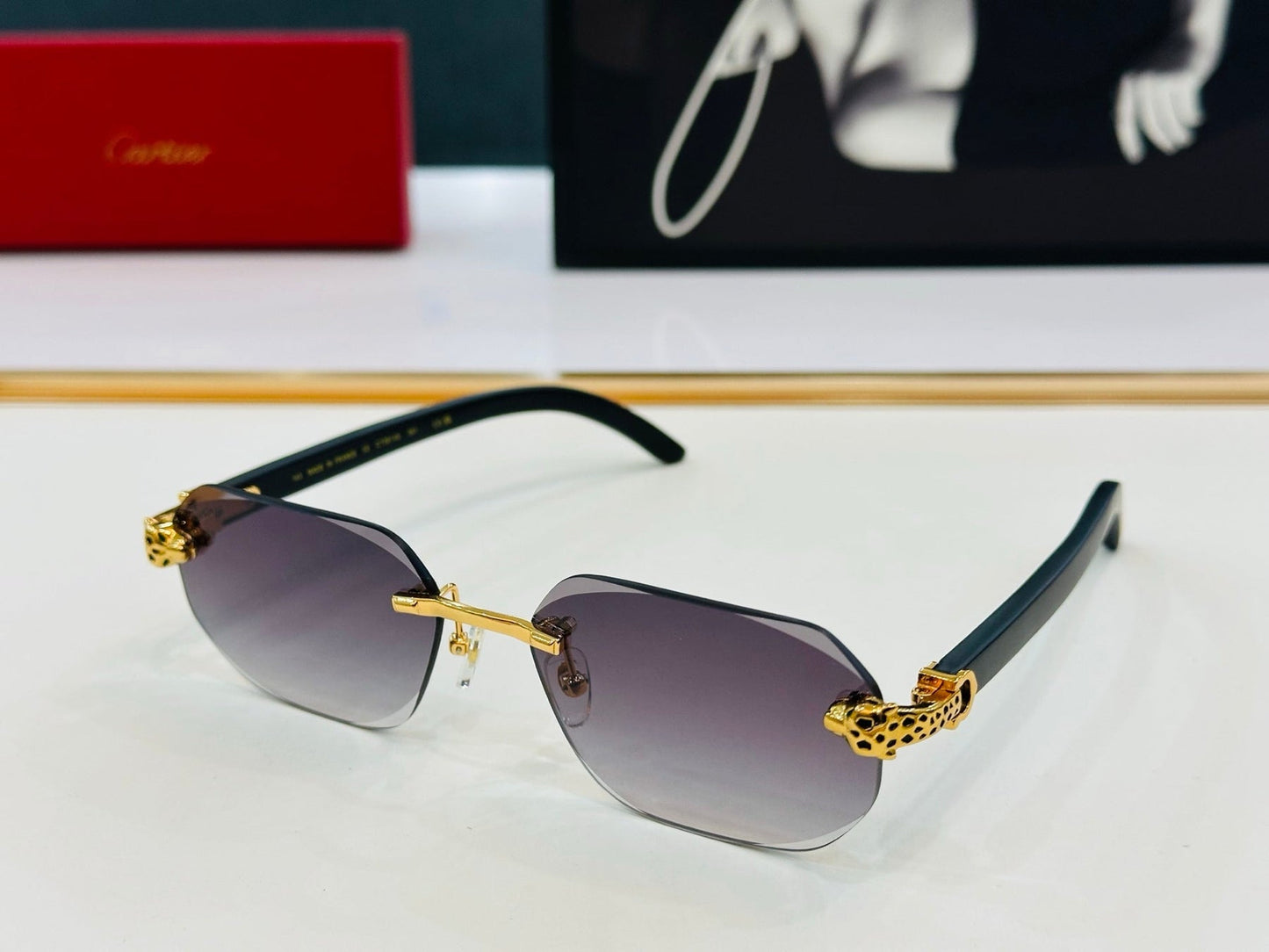 PANTHÈRE RIMLESS OVAL FRAME SUNGLASSES  543637 IN METAL