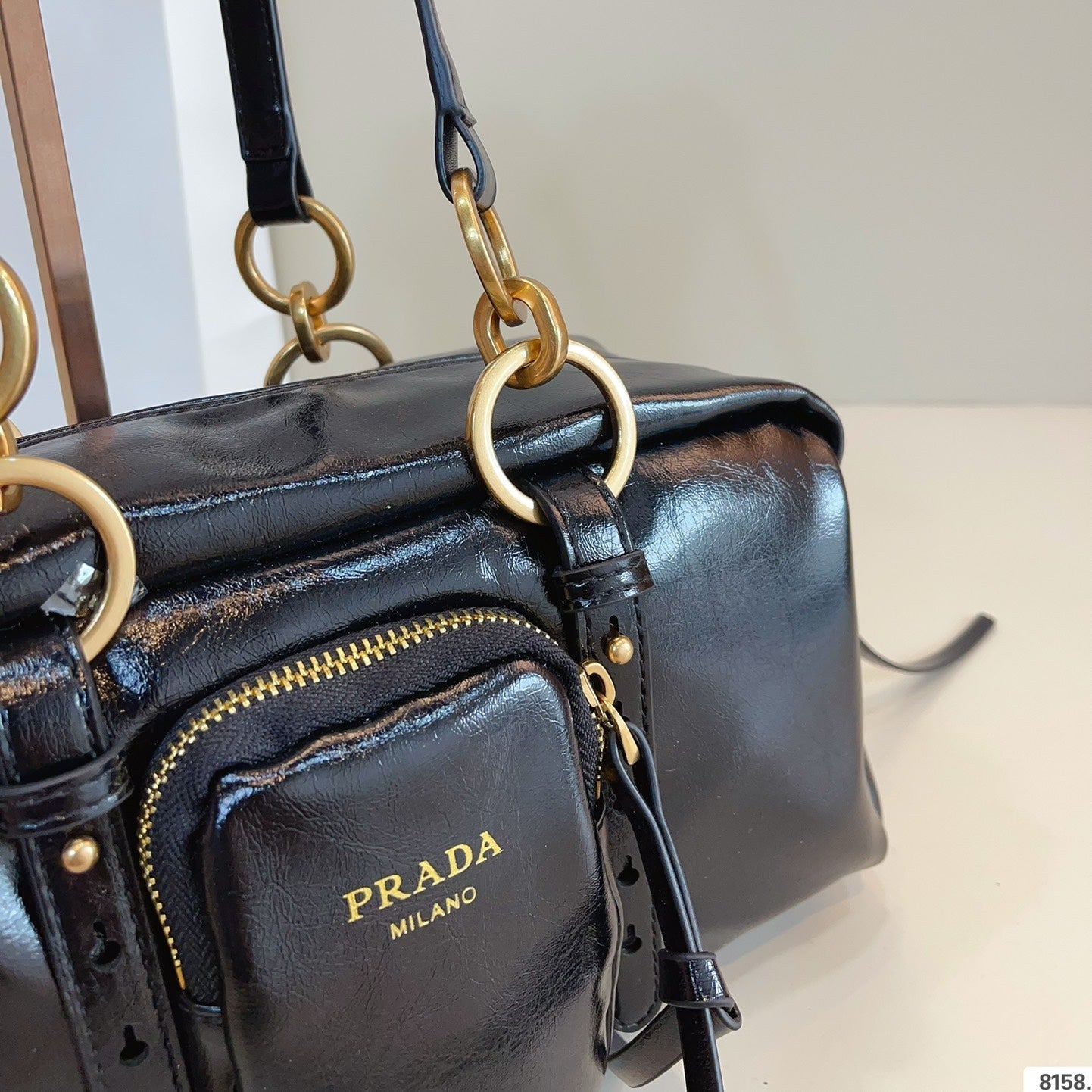 DANGLE TOP HANDLE BAG 30 IN BLACK PATENT CALFSKIN