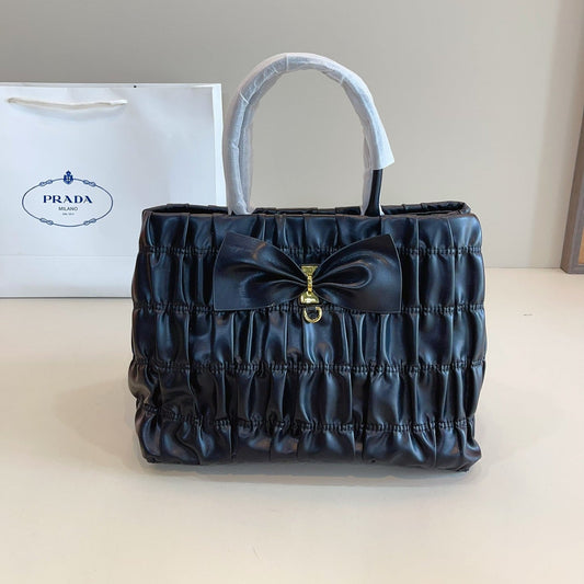 BOW DETAIL RUCHED TOP HANDLE BAG 29 IN BLACK SAFFIANO LEATHER