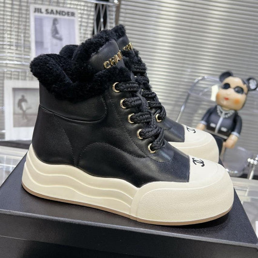 MARTIN BOOTS IN BLACK CALFSKIN AND LAMB FUR LINING