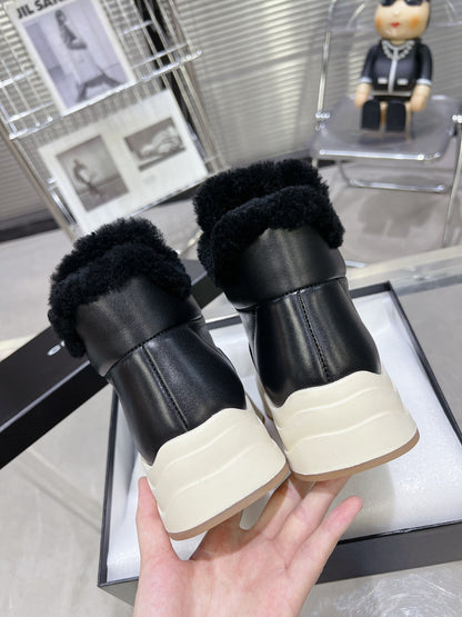 MARTIN BOOTS IN BLACK CALFSKIN AND LAMB FUR LINING