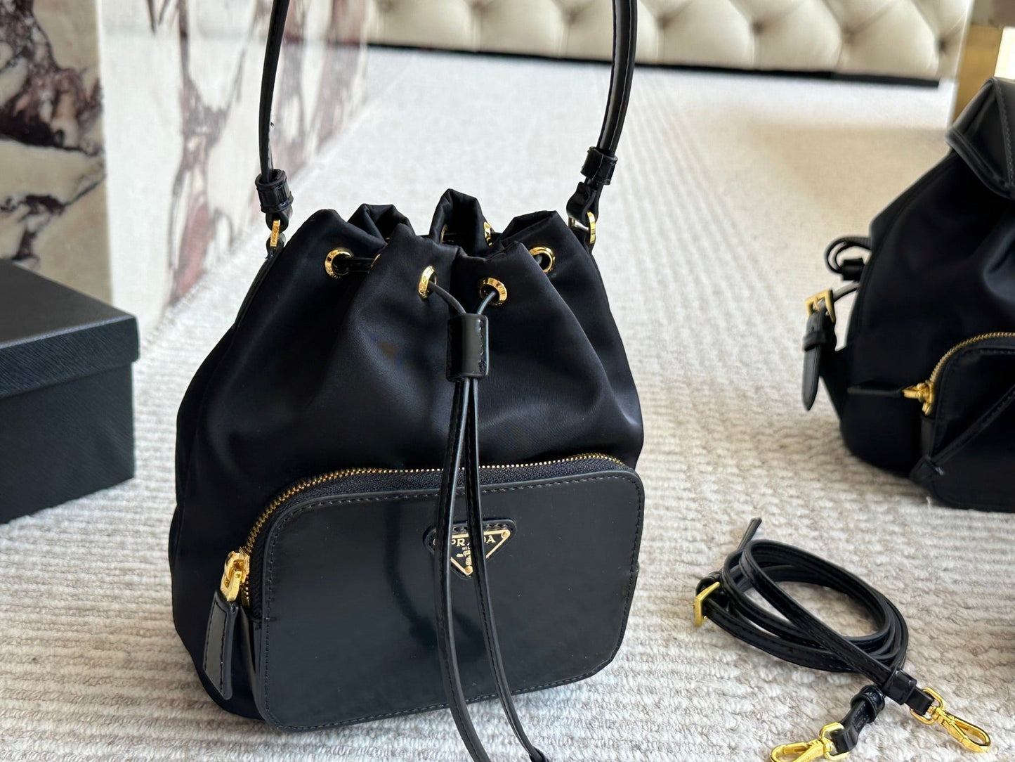 DRAWSTRING HOBO BAG 21 IN BLACK RE-NYLON AND CALFSKIN HANDLE