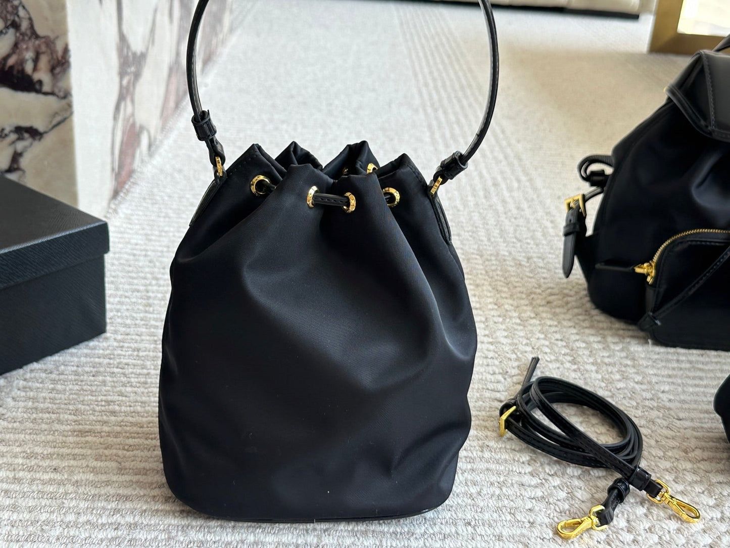 DRAWSTRING HOBO BAG 21 IN BLACK RE-NYLON AND CALFSKIN HANDLE