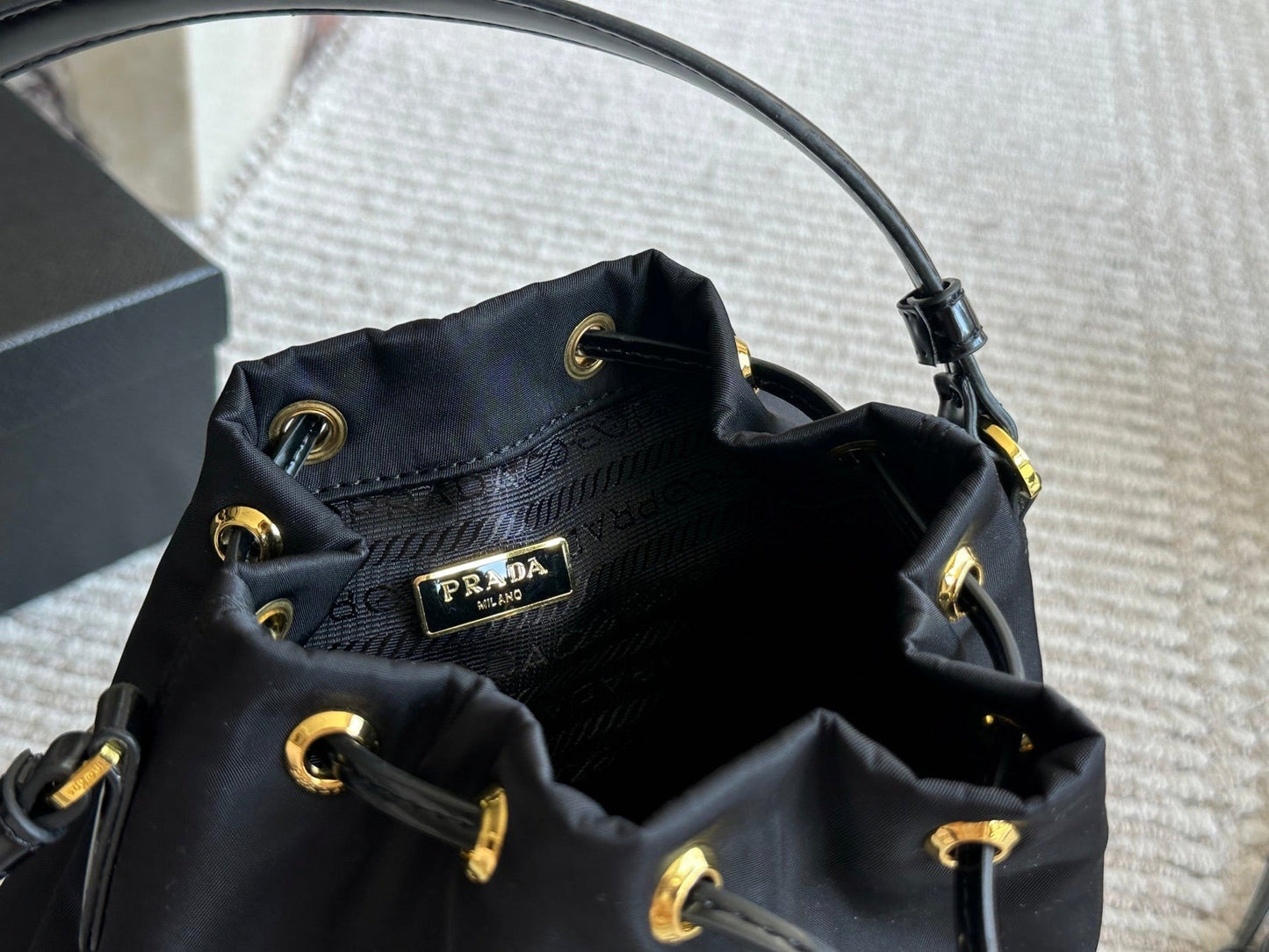 DRAWSTRING HOBO BAG 21 IN BLACK RE-NYLON AND CALFSKIN HANDLE