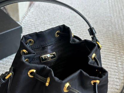 DRAWSTRING HOBO BAG 21 IN BLACK RE-NYLON AND CALFSKIN HANDLE