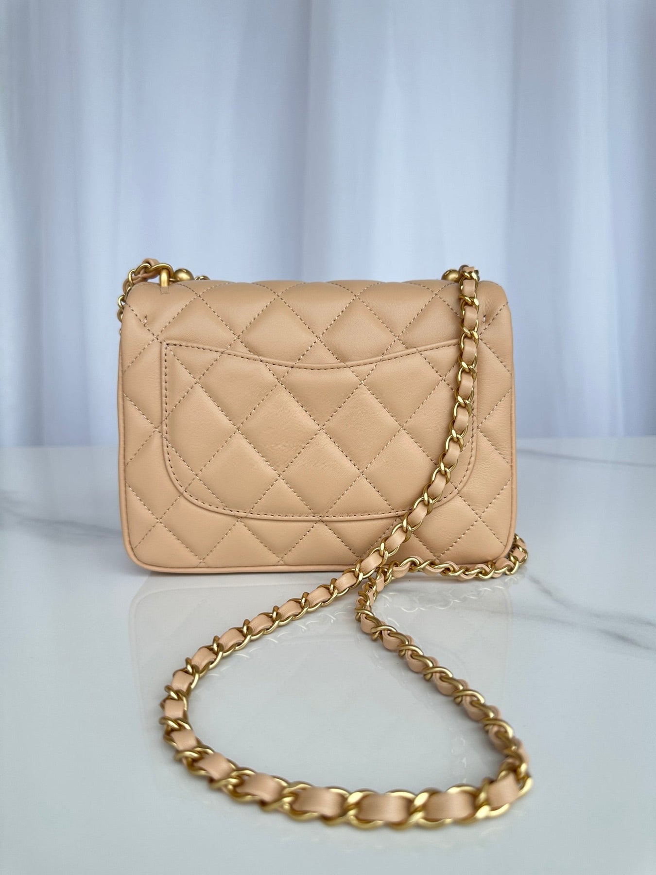 CC SMALL 20 FLAP BAG IN BUFF CREAM CALFSKIN