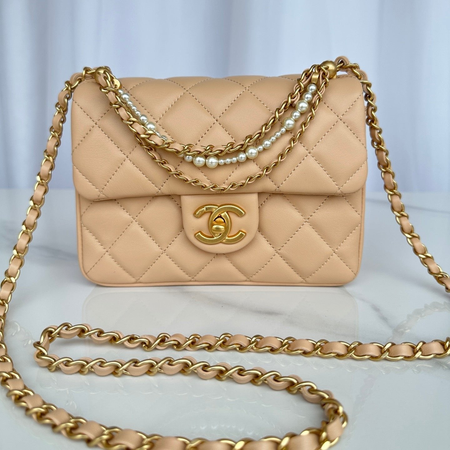 CC SMALL 20 FLAP BAG IN BUFF CREAM CALFSKIN