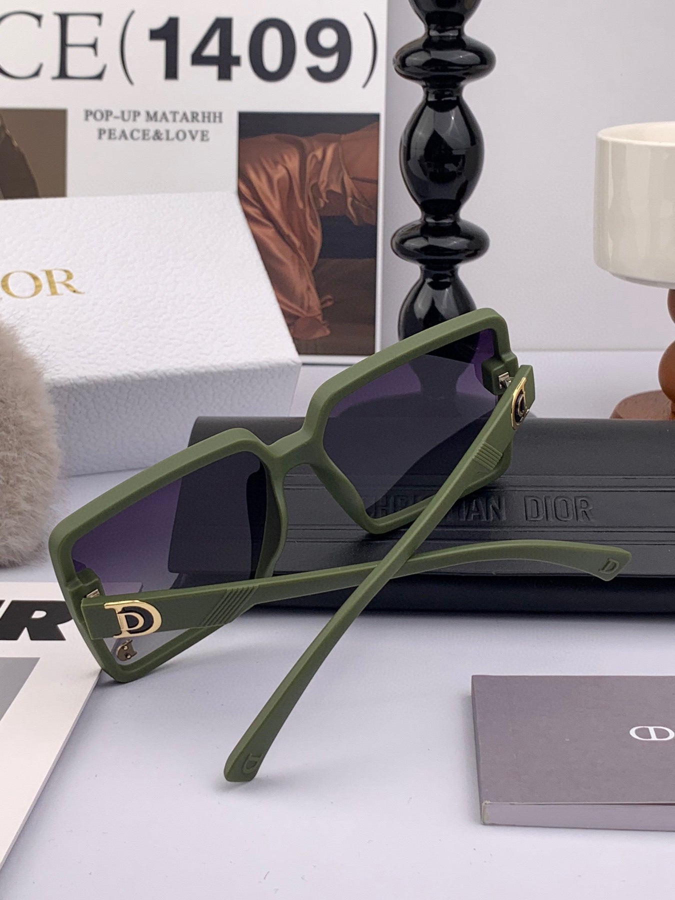 MONTAIGNE SUNGLASS CD1595 IN GREEN ACETATE