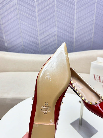 ROCKSTUD FLAT PUMP IN BERRY RED CALFSKIN