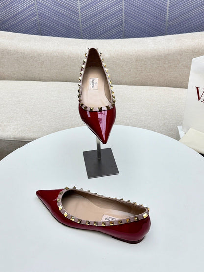 ROCKSTUD FLAT PUMP IN BERRY RED CALFSKIN