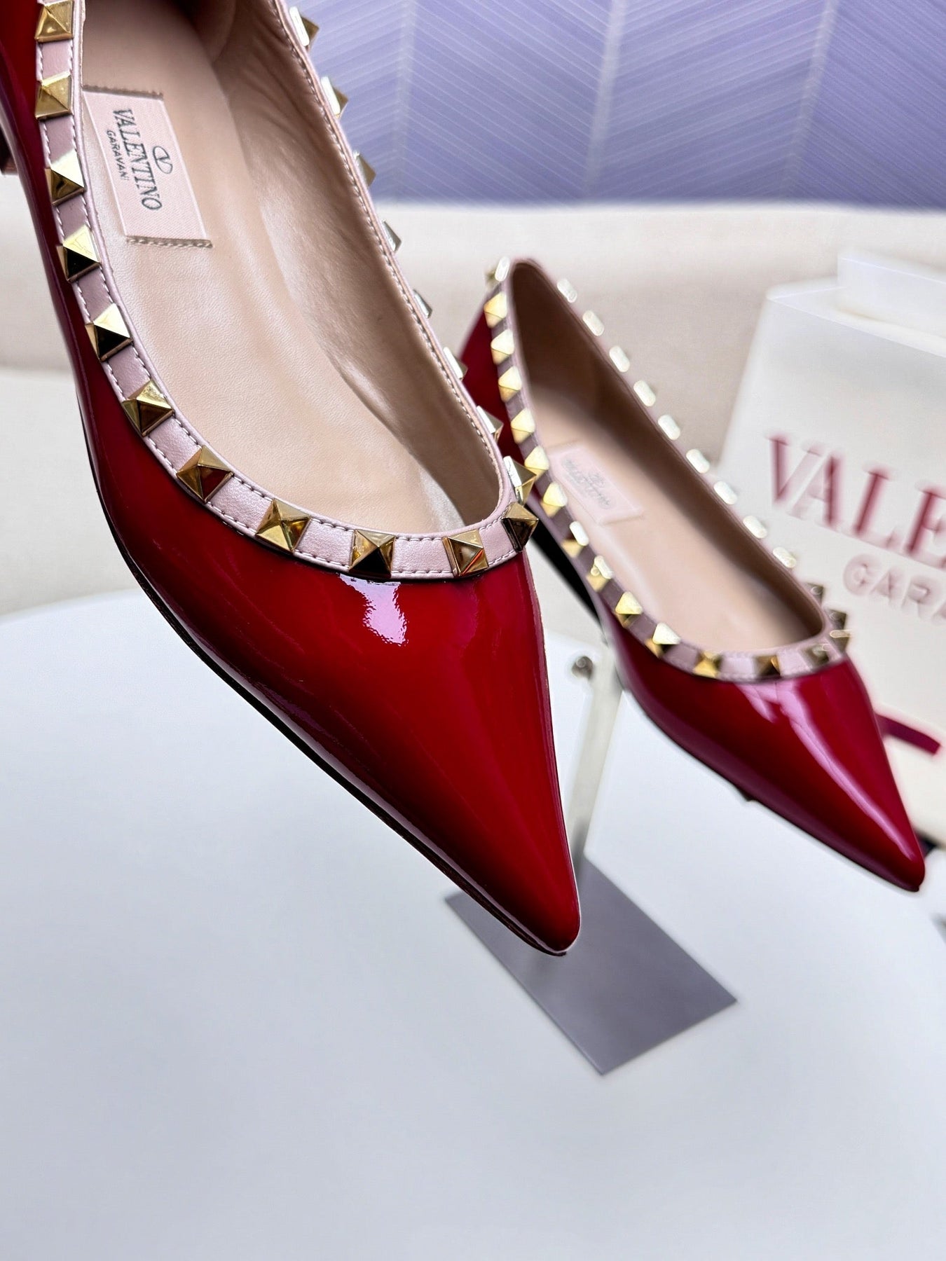 ROCKSTUD FLAT PUMP IN BERRY RED CALFSKIN