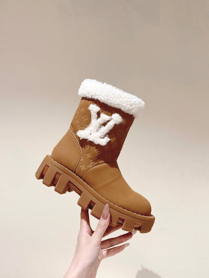 ANKLE BOOTS IN BRONZE BROWN EMBOSSED CALFSKIN AND WHITE SHEARLING