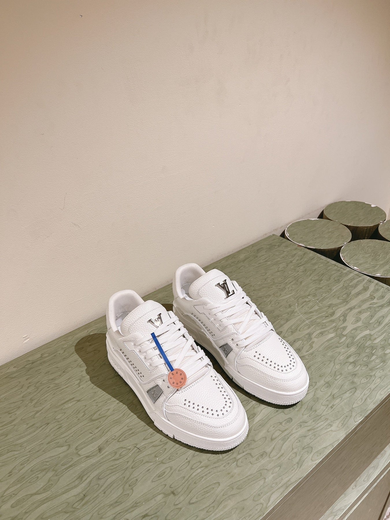 LV TRAINER SNEAKER IN WHITE CALFSKIN