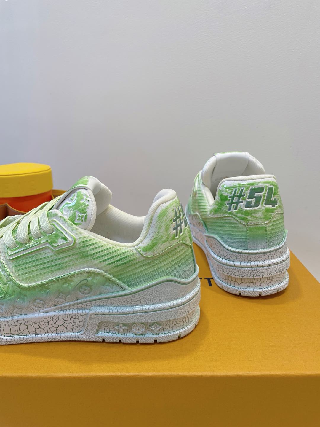 LV TRAINER MAXI SNEAKER IN GREEN PASTEL EMBOSSED CALFSKIN