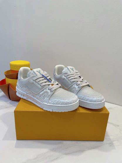 LV TRAINER MAXI SNEAKER IN WHITE EMBOSSED CALFSKIN