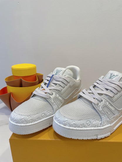LV TRAINER MAXI SNEAKER IN WHITE EMBOSSED CALFSKIN
