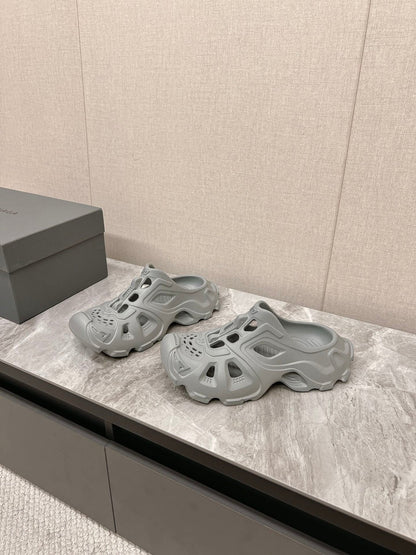 CUT-OUT MULES IN GRAY RUBBER