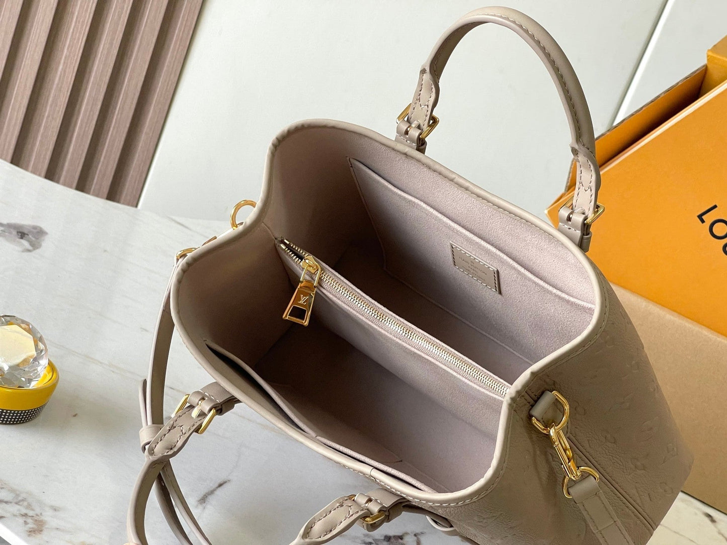 BABYLONE TOTE 31 IN TOURTERELLE MONOGRAM EMPREINTE LEATHER