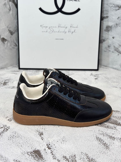 RETRO SNEAKERS IN BLACK LAMBSKIN WITH KNITTED PATTERN