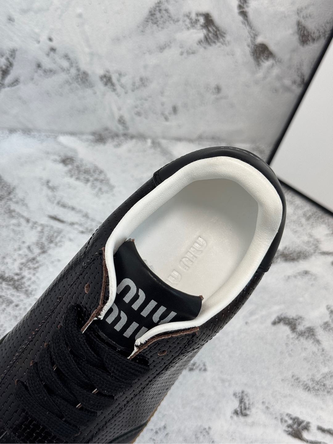 RETRO SNEAKERS IN BLACK LAMBSKIN WITH KNITTED PATTERN