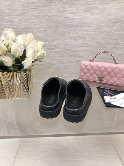 CC TURNLOCK FLAP MULES BLACK LAMBSKIN