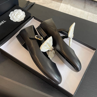 BALLET FLAT BLACK LAMBSKIN WITH WHITE BOW
