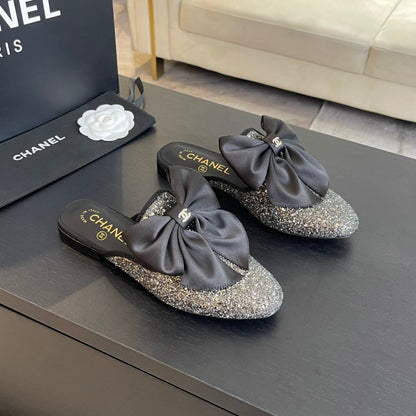 BIG BOW FLAT MULE SANDALS IN BLACK SILK WITH GLITTER SEQUINS