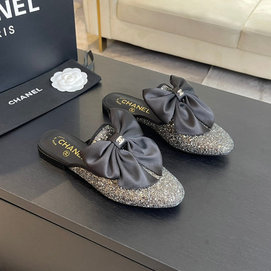BIG BOW FLAT MULE SANDALS IN BLACK SILK WITH GLITTER SEQUINS