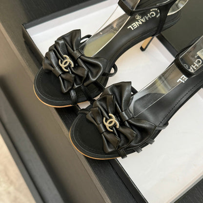 HIGH HEEL SANDAL WITH BOW IN BLACK LAMBSKIN