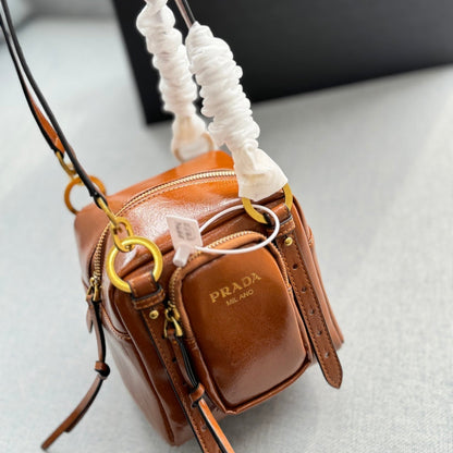 DANGLE TOP HANDLE MINI BAG 15 IN BROWN PATENT CALFSKIN