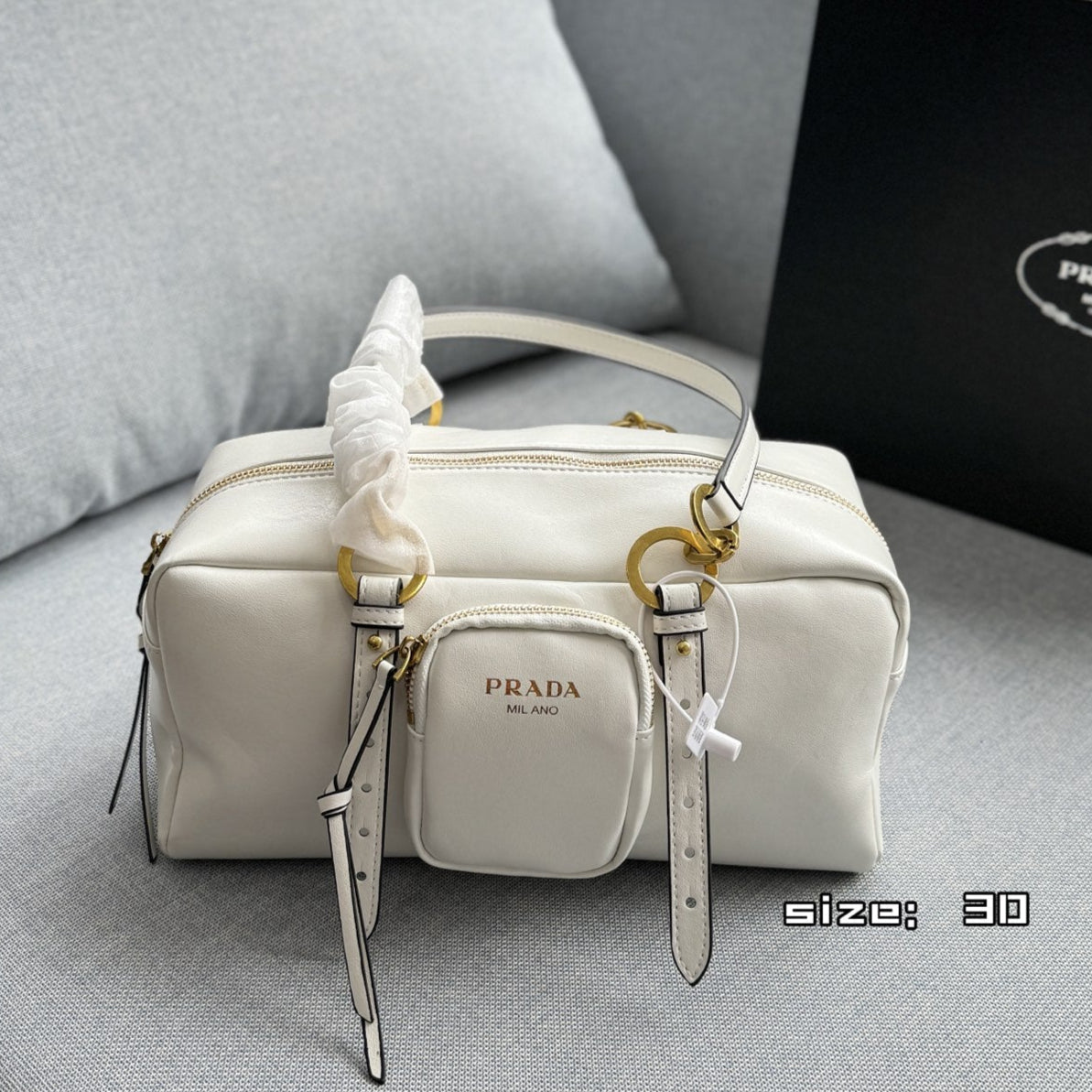 DANGLE TOP HANDLE BAG 30 IN WHITE SHINY CALFSKIN