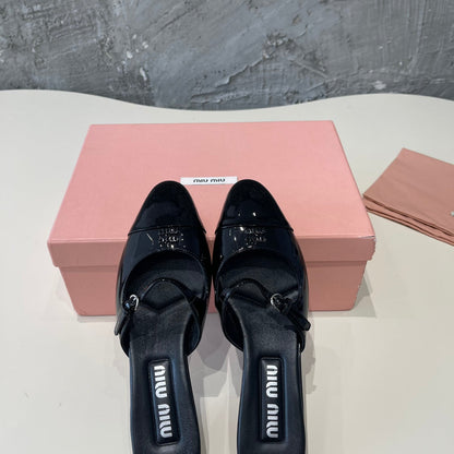 CAP TOE MULES BLACK SHEEPSKIN