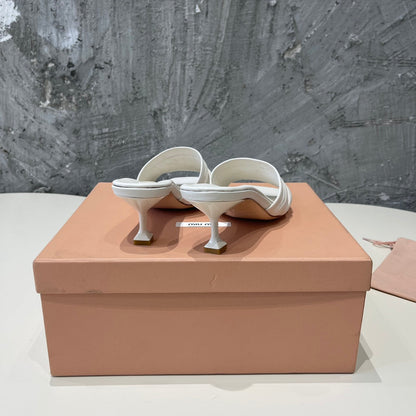 HIGH - HEEL WHITE SHEEPSKIN WITH STYLIZED STRAPS