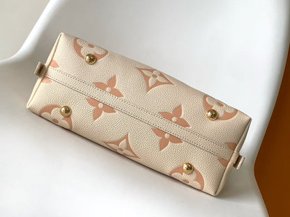 CARRYALL PM 29 BAG IN BEIGE MIX PINK MONOGRAM EMPREINTE LEATHER