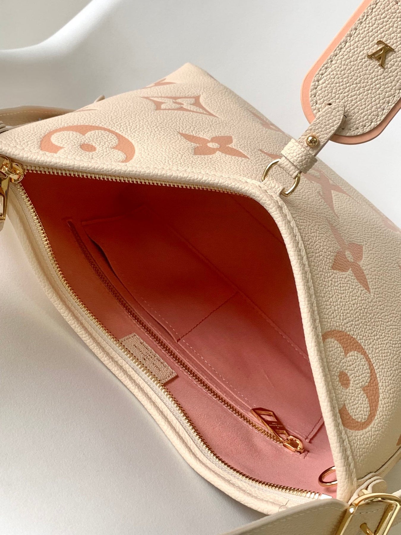 CARRYALL PM 29 BAG IN BEIGE MIX PINK MONOGRAM EMPREINTE LEATHER