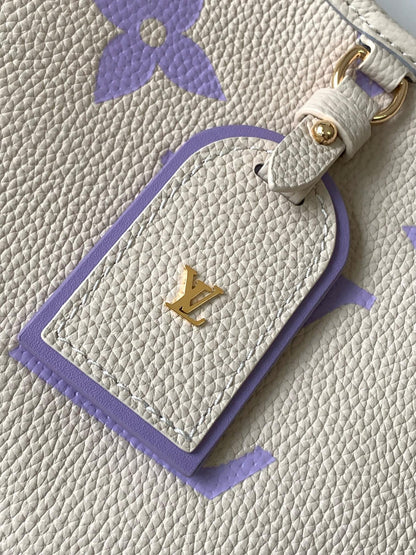 CARRYALL PM 29 BAG IN BEIGE MIX PURPLE MONOGRAM EMPREINTE LEATHER