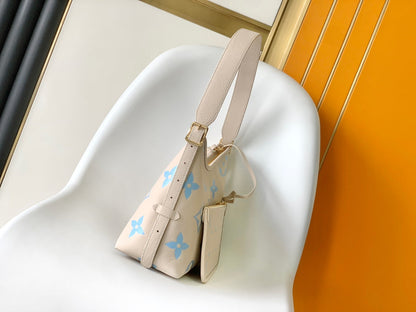 CARRYALL PM 29 BAG IN BEIGE MIX BLUE MONOGRAM EMPREINTE LEATHER