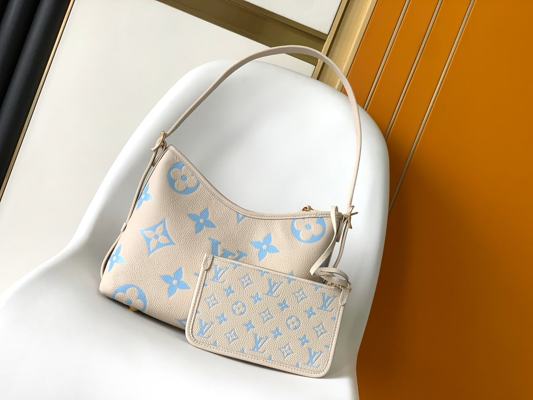 CARRYALL PM 29 BAG IN BEIGE MIX BLUE MONOGRAM EMPREINTE LEATHER