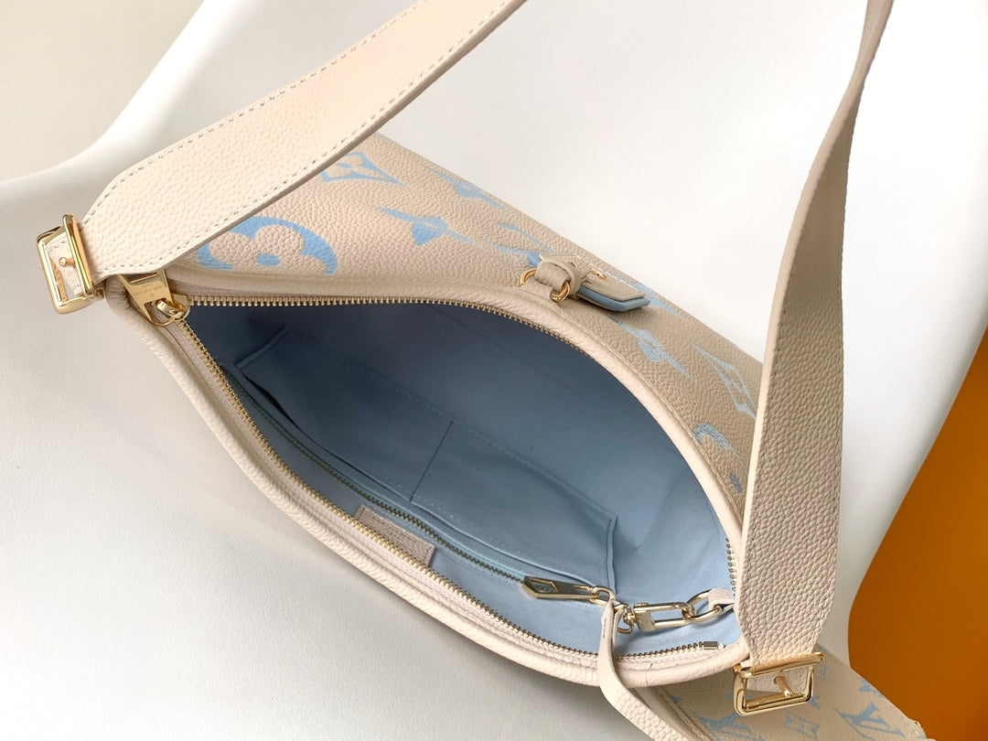 CARRYALL PM 29 BAG IN BEIGE MIX BLUE MONOGRAM EMPREINTE LEATHER