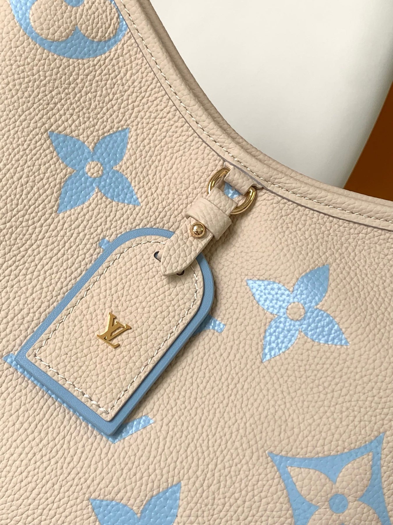 CARRYALL PM 29 BAG IN BEIGE MIX BLUE MONOGRAM EMPREINTE LEATHER