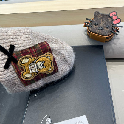 BEANIE HAT IN CAMEL BEIGE WOOL WITH BOW 421255