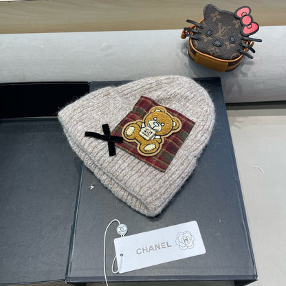 BEANIE HAT IN CAMEL BEIGE WOOL WITH BOW 421255