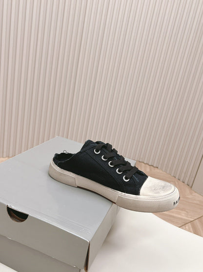 PARIS MULES IN BLACK DESTROYED DENIM AND RUBBER