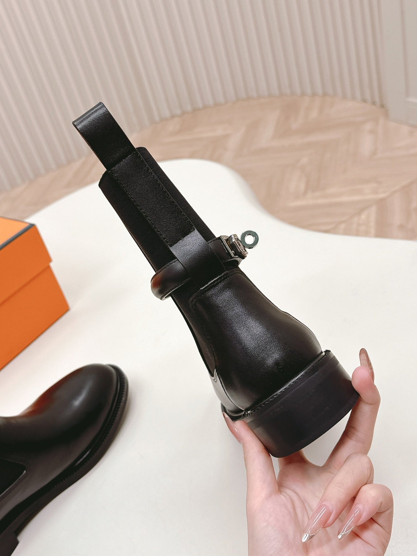 KELLY BUCKLE SHORT BOOTS IN BLACK CALFSKIN