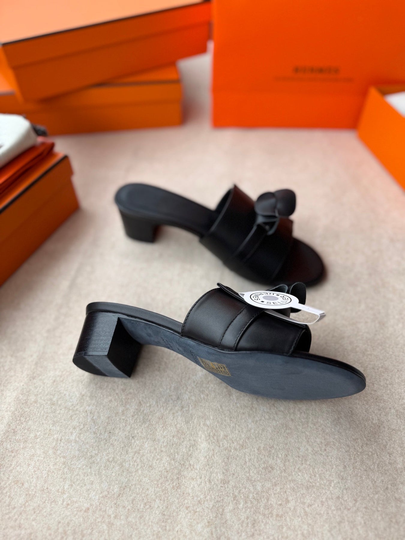 HIGH MULES IN BLACK CALFSKIN